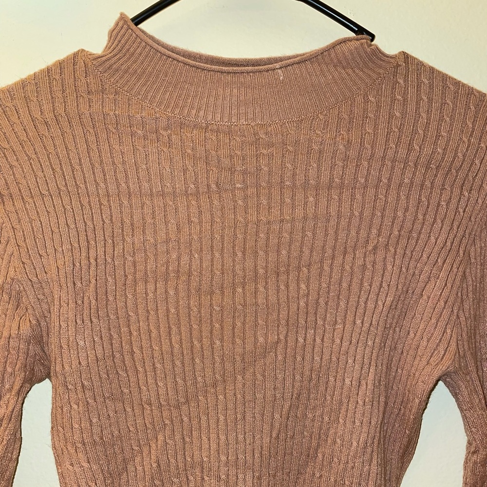 Tan turtle neck. Medium